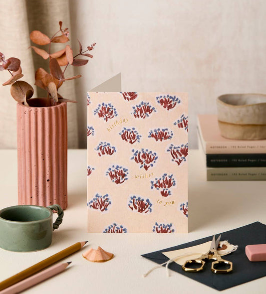 Tarjeta Cumpleaños flores granates