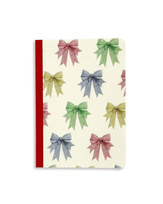 Notebook with colorful checkered bows on a white background