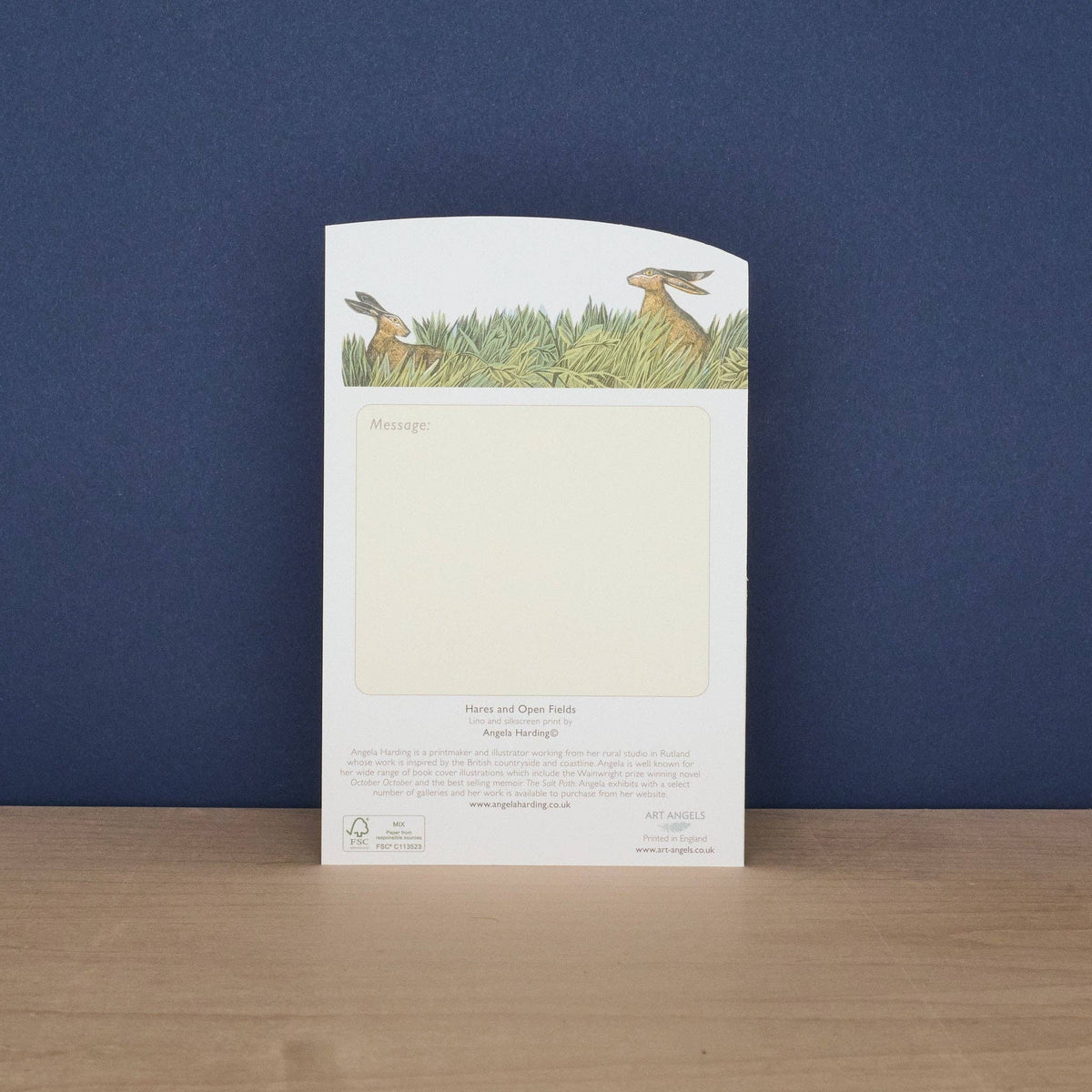 Notebook with rabbit illustration on a blue background