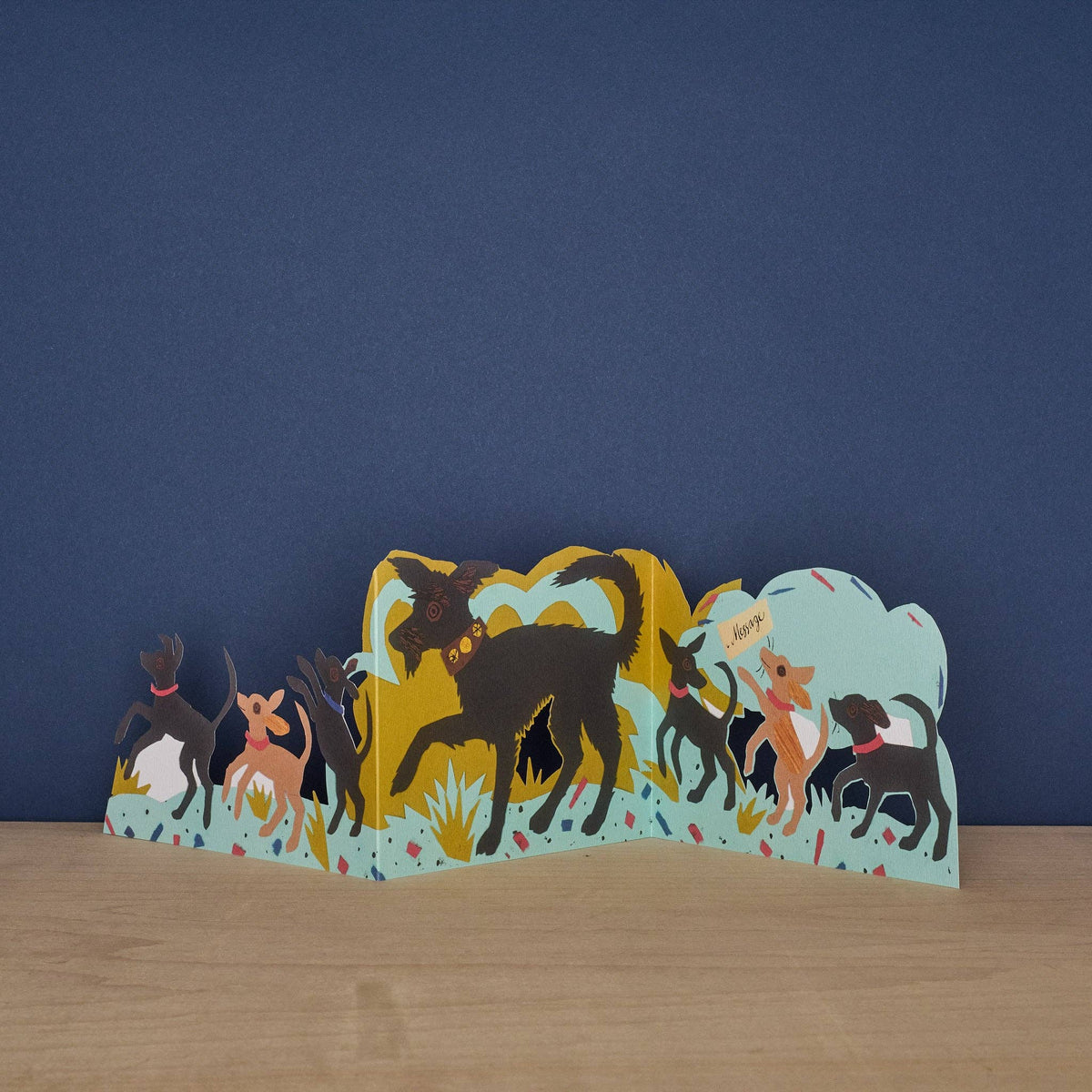 Cardboard standee with cartoon dogs on a blue background