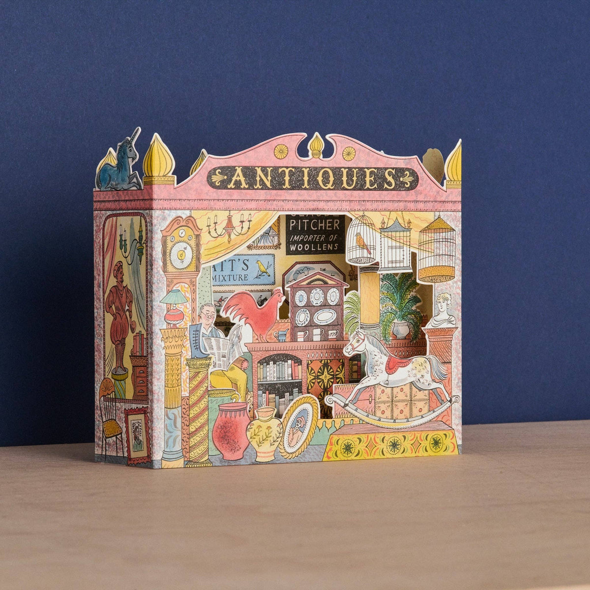 Decorative box with vintage antiques store design on a blue background