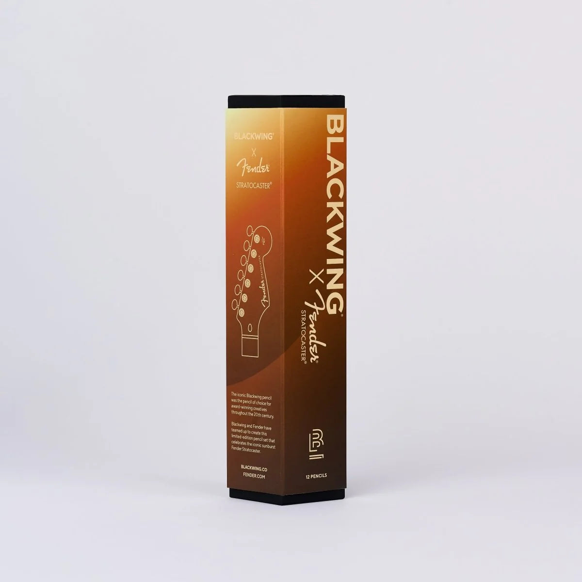 A tall rectangular product box for Fender Blackwing Psychoelectric powder paint, featuring a gradient from golden yellow to dark brown with gold lettering, set against a plain light gray background.