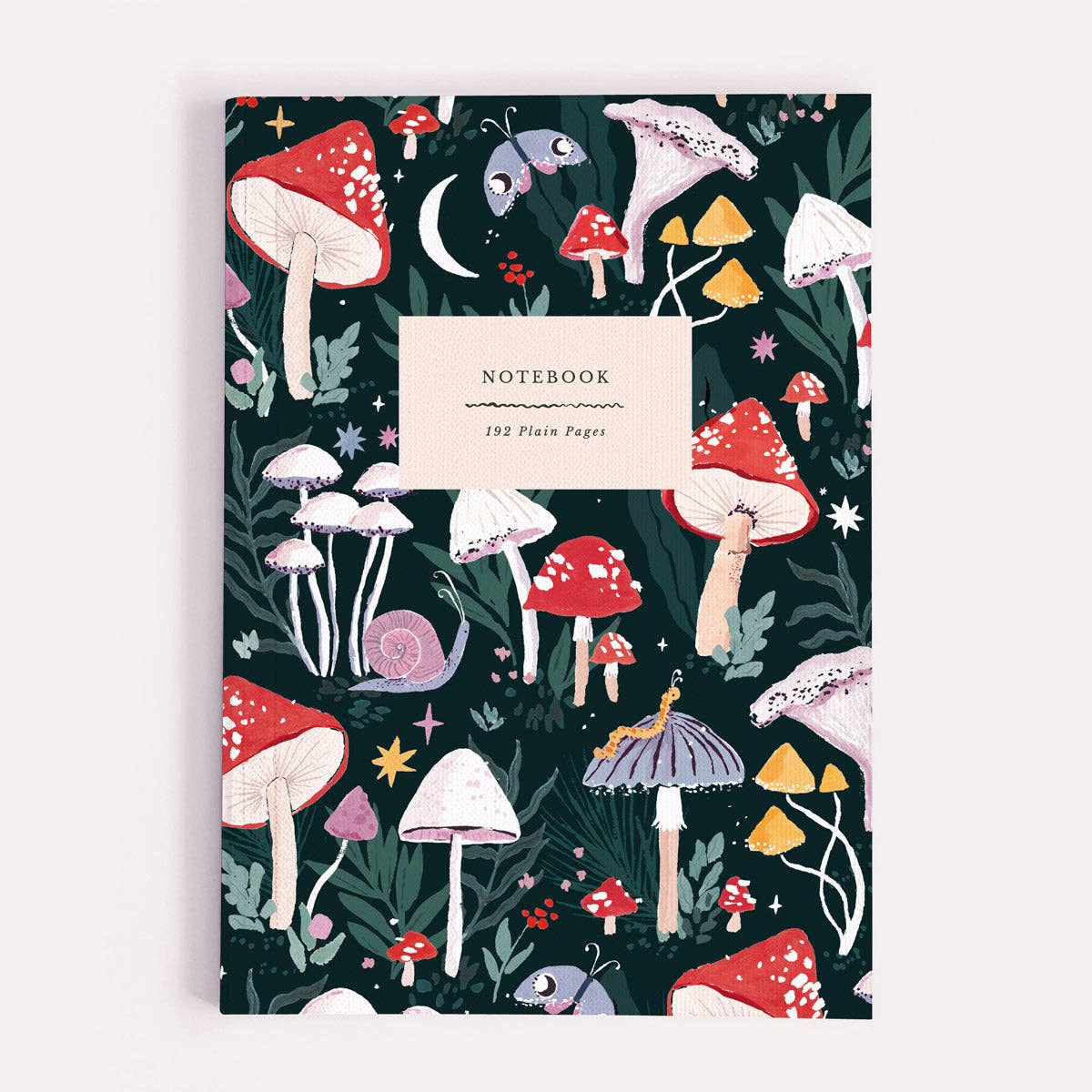 Notebook with a colorful mushroom pattern on a dark green background