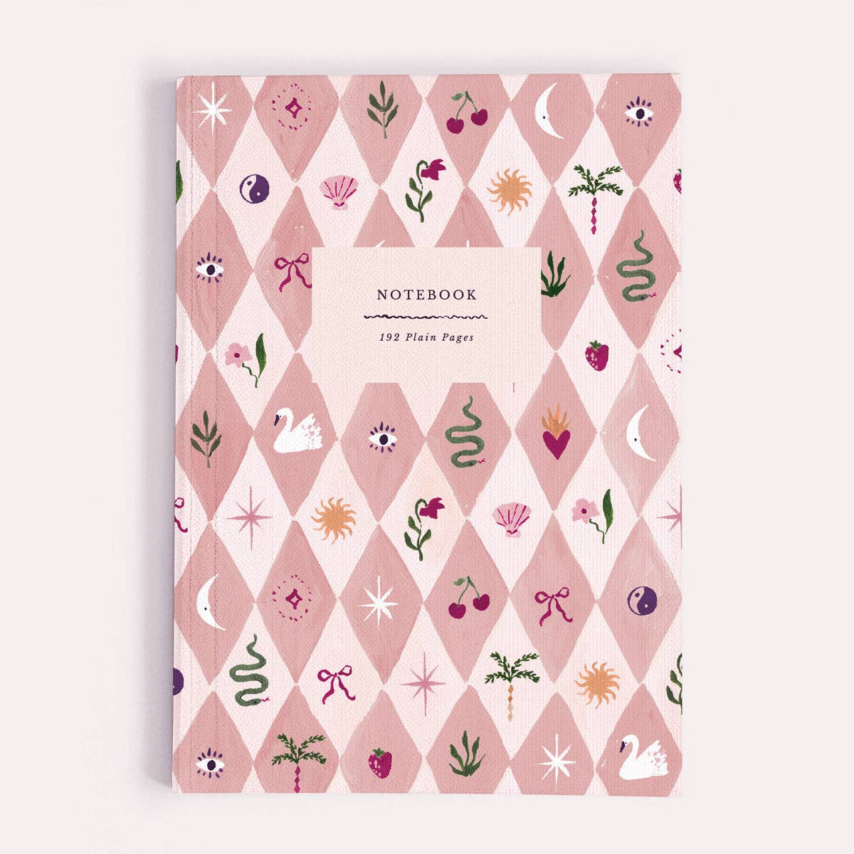 Notebook with decorative cover featuring geometric pattern and illustrations on a white background