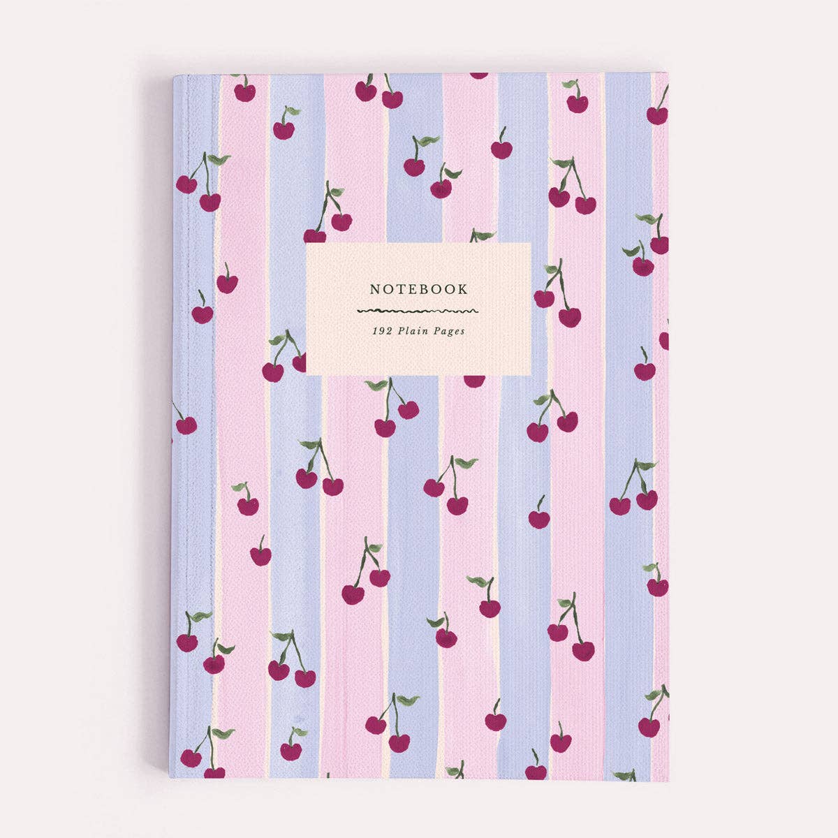 Notebook with cherry and striped pattern on a white background